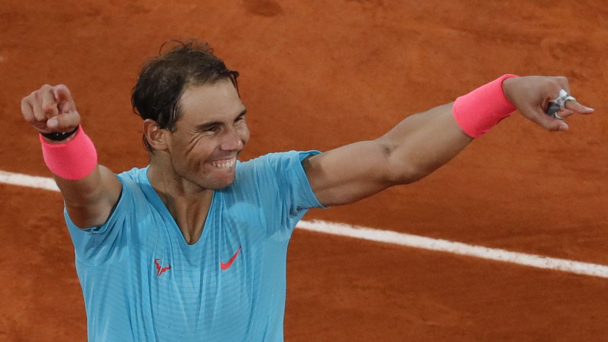 Spain's Rafael Nadal celebrates winning the final match of the French Open tennis tournament...