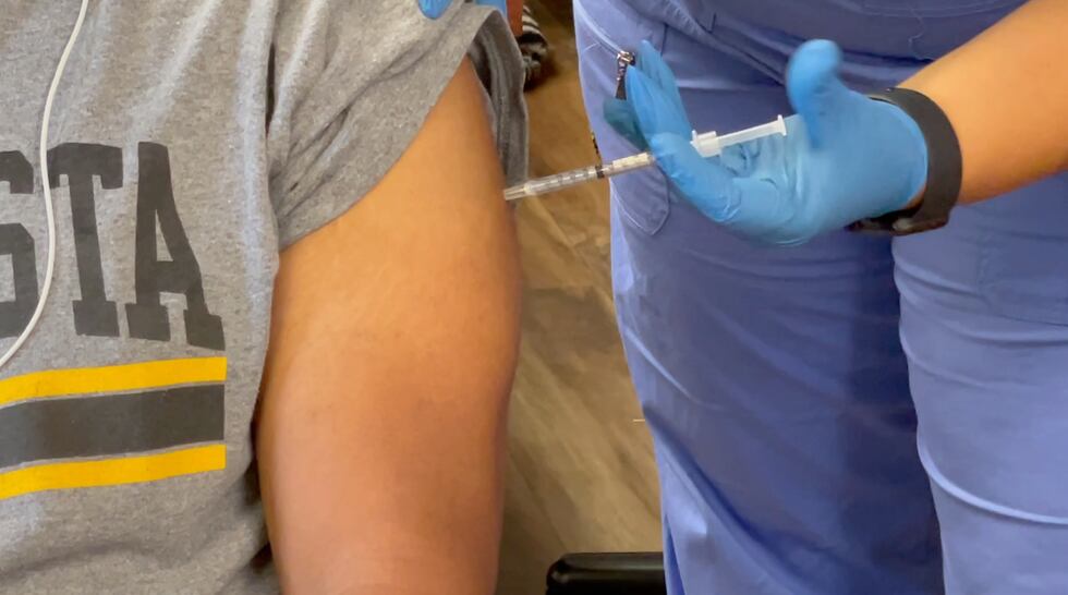 Dove Barbershop hosts vaccine popup.