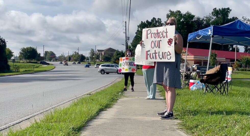 Members of CLASS gathered to protest against the school board COVID guidelines.