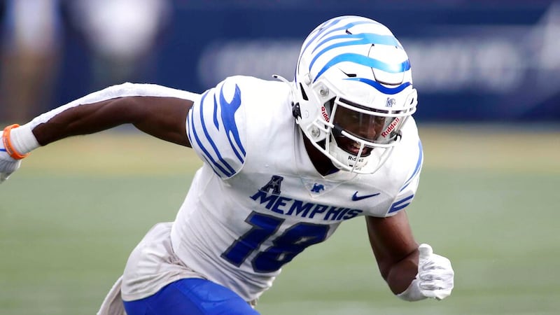 Memphis Tigers wide receiver Eddie Lewis (18) runs during an NCAA football game against the...