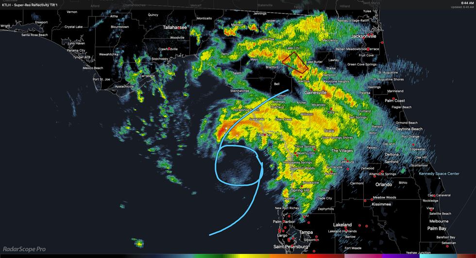 The radar image of Tropical Storm Elsa along with the center of the storm drawn as of 6:44...