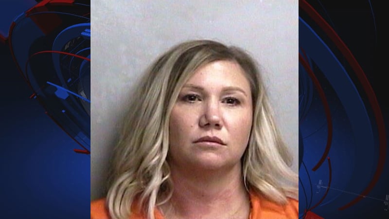 Julie Hoover, 38, is a teacher at Point of Grace Christian School in Perry, according to...
