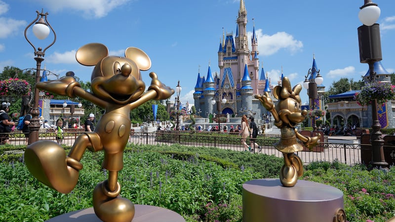 FILE - The Cinderella Castle is seen at the Magic Kingdom at Walt Disney World, July 14, 2023,...